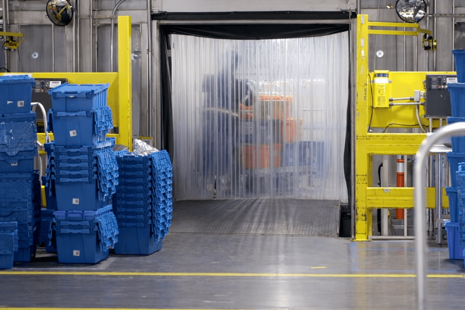 Cold storage loading dock with strip curtain