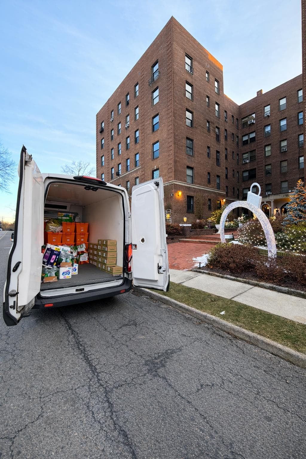 Refrigerated delivery van at residential building